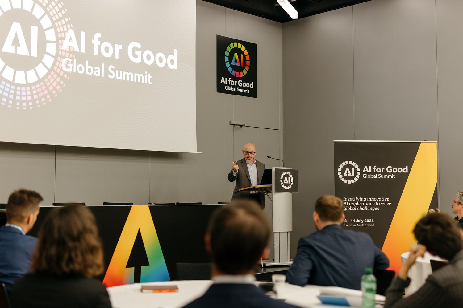 Diplo/GIP at AI for Good Global Summit 9 Crowd, Person, Audience, Boy, Child, Male, Speech, People, Head, Face, Podium, Clothing, Formal Wear, Suit, Miha Mazzini, Carlos Julio Arosemena Monroy