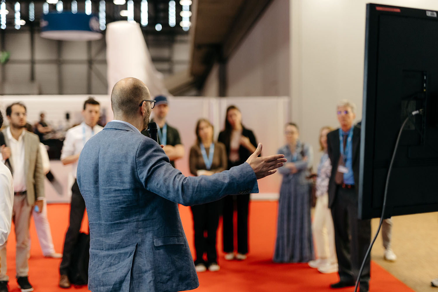 Diplo/GIP at AI for Good Global Summit 8 Crowd, Person, Adult, Male, Man, Audience, Clothing, Coat, Formal Wear, Suit, Speech, Footwear, Shoe, Face, Head, FORG1VEN, Kyle Busch, Patrik Berglund