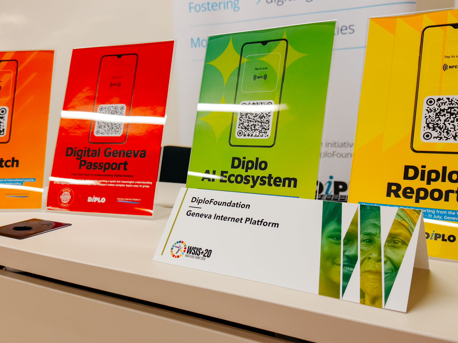 Diplo/GIP at the WSIS+20 High-Level Event 2025 5 Advertisement, Poster, Electronics, Phone, Person, QR Code, Business Card, Paper, Text, Mobile Phone